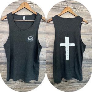Males tank-tops with a cross and band logo on it